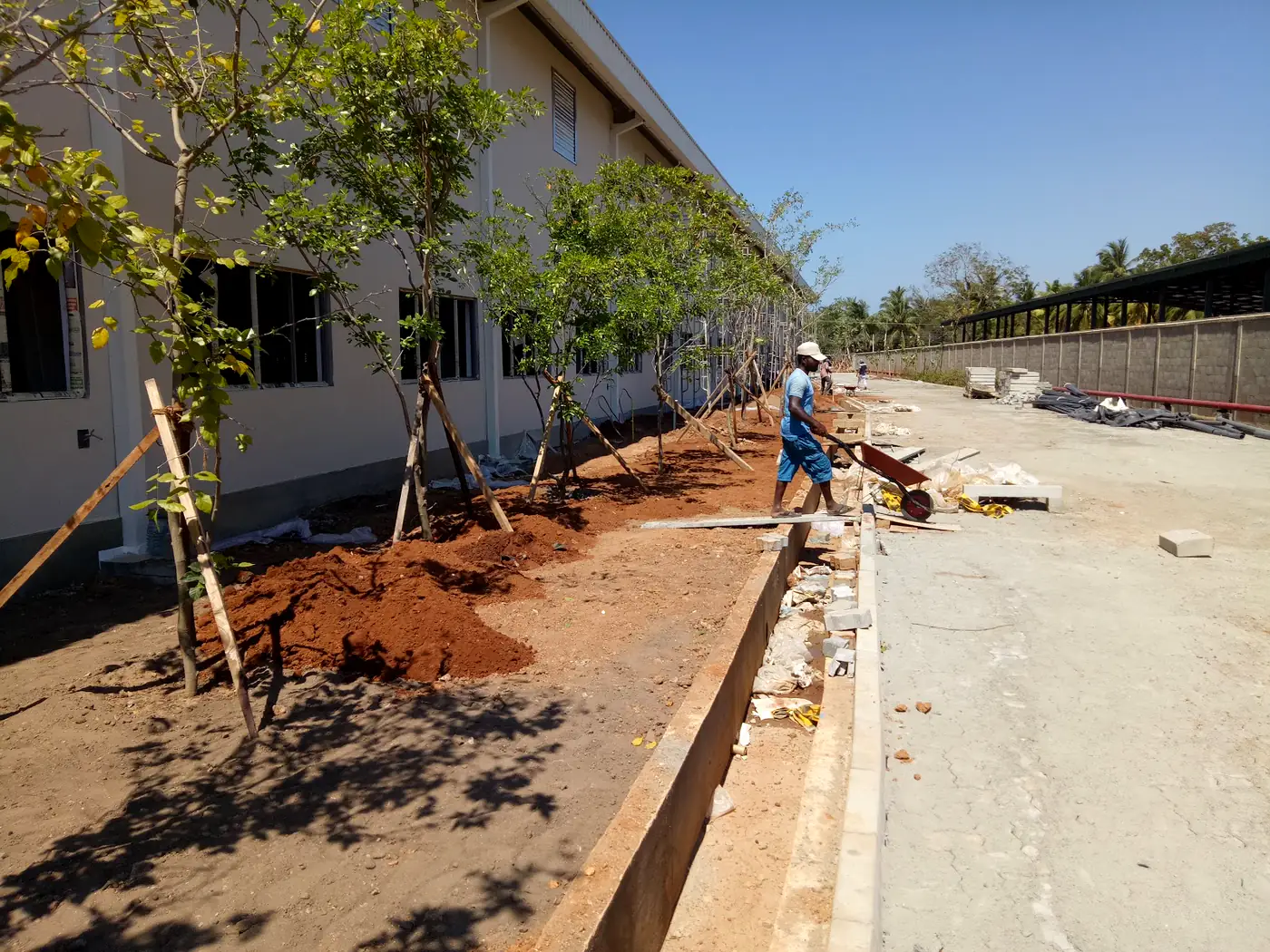Completed lawns and shaped planting beds fronting the Brandix apparel facility in Batticaloa