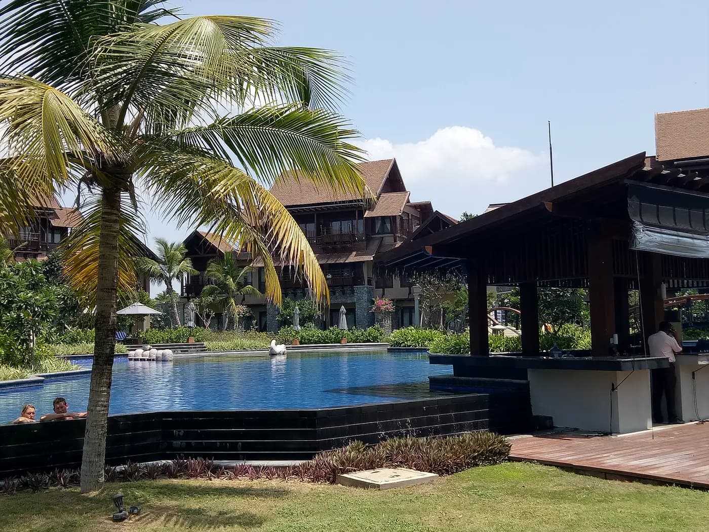 Mature planting framing the resort buildings at Hotel Anantaya, Pasikuda